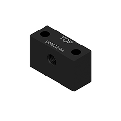 A black rectangular mounting block for proximity probes, with the word TOP and DM922-2A engraved on the top.
