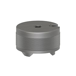 A circular MH114-3T stainless steel accelerometer mounting magnet with two mounting rails on the bottom, knurled ring around the perimeter, and integral stud extending from the center of the top.