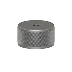 A circular MH123-1A stainless steel accelerometer mounting magnet with a flat bottom, knurled ring around the perimeter, and circular through-hole in the center of the top.