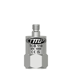 A small, top exit TMP Line vibration analysis sensor engraved with the TCB110 part number and other identifying product information.