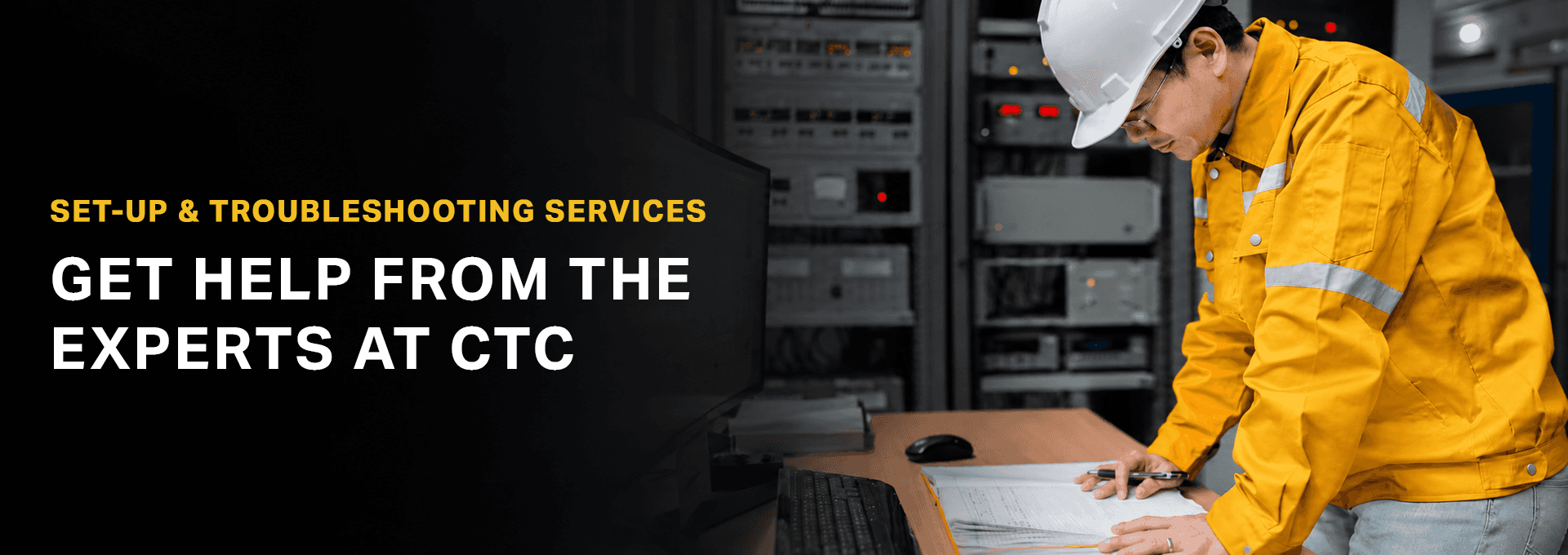 A web banner with a photo of a vibration analyst in a yellow hi-vis jacket and hard hat looking at documentation on a table, with text saying: 
Set-Up &amp; Troubleshooting Services
Get Help From The Experts At CTC