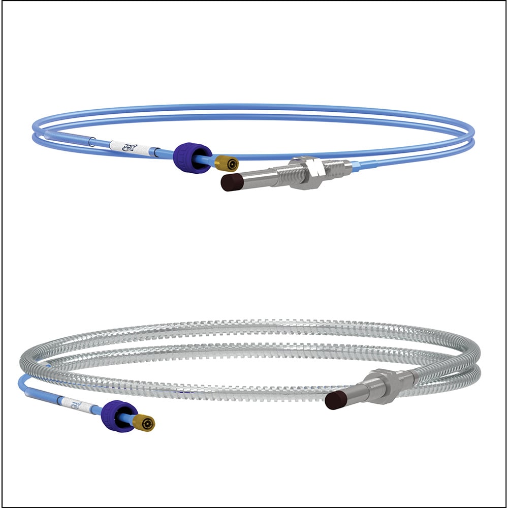 picture of two proximity probe cables, one with standard blue FEP jacket, and the other with metal armored jacket