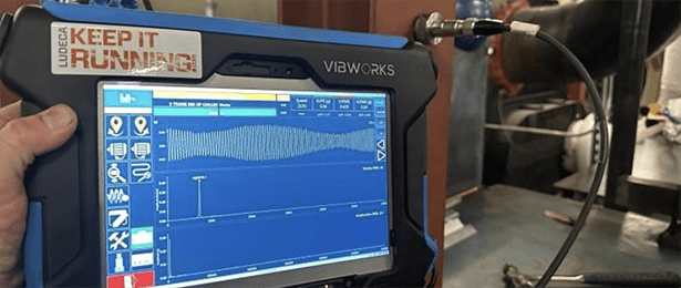 A photo of a Betavib VibWorks data collector and a CTC AC192 accelerometer mounted on machine.