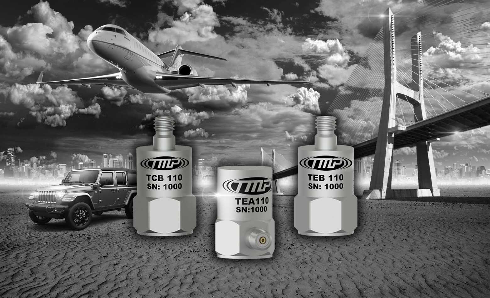 two top exit and one side exit TMP test and measurement vibration monitoring sensors in front of a black and white collage of a car, airplane, and suspension bridge