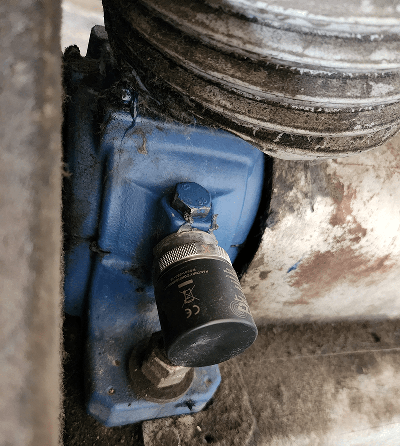 A photograph of a CTC Connect wireless sensor mounted to an industrial machine.